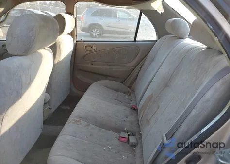 1999 Toyota Corolla Le from USA, damaged, VIN 2T1BR18E9XC119184